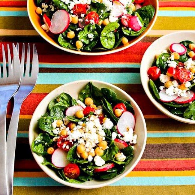 Mediterranean Spinach Salad finished salads in serving bowls