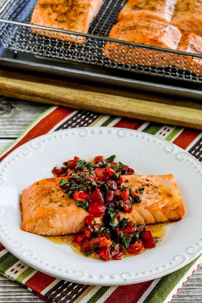 Salmon with Tomato and Olive Relish photo of finished dish with Air Fryer rack in back