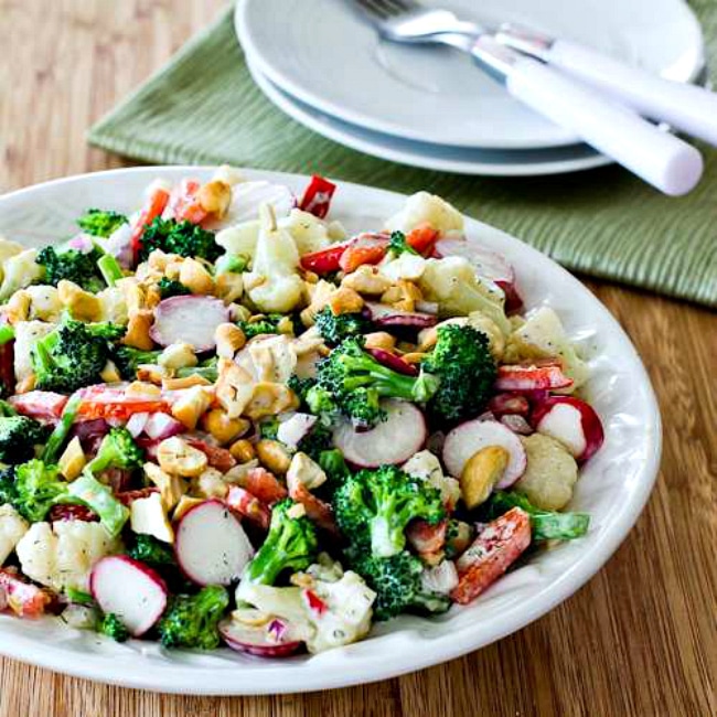 Broccoli, Cauliflower, and Radish Salad with Cashews photo of finished salad in bowl