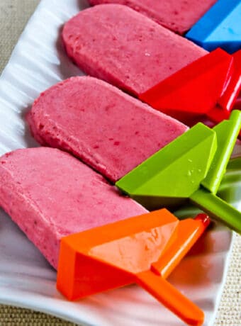 Low-Sugar Strawberry Frozen Yogurt Pops on serving dish.