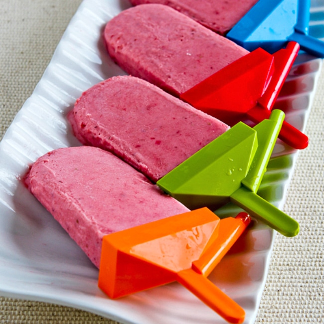 Low-Sugar Strawberry Frozen Yogurt Pops square image of finished pops on plate