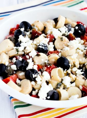 Tomato Salad with Hearts of Palm, Olives, and Feta close-up photo