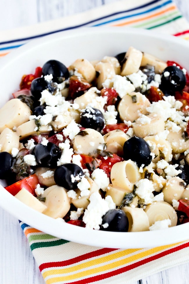 Tomato Salad with Hearts of Palm, Olives, and Feta close-up photo