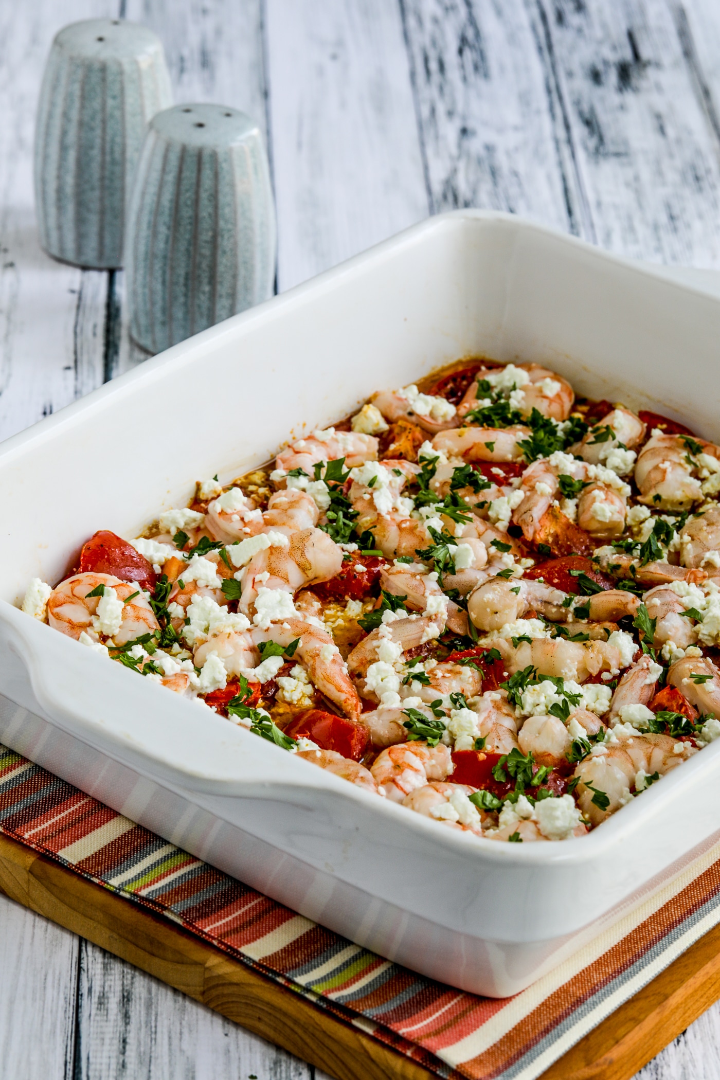 Roasted Tomatoes and Shrimp with Feta close-up of finished recipe in casserole dish