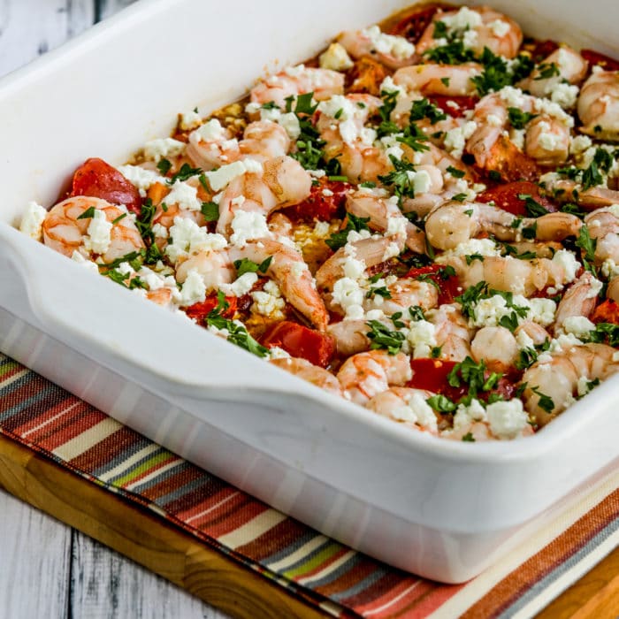 Roasted Tomatoes and Shrimp with Feta close-up square image of finished recipe in baking dish