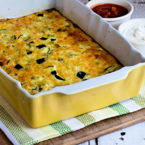 Zucchini and Green Chile Breakfast Casserole close-up photo of finished casserole in baking dish.