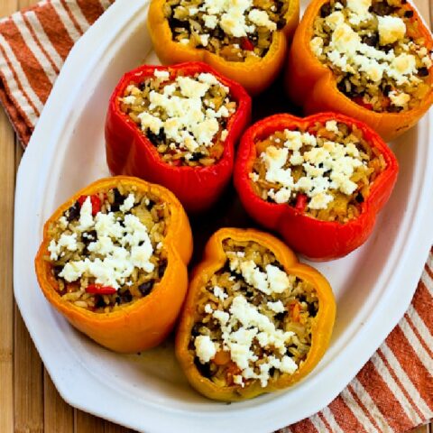 Vegetarian Stuffed Peppers , six peppers on serving plate