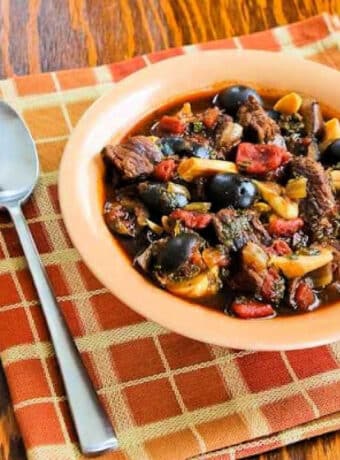 Square image for Mediterranean Beef Stew in serving bowl.