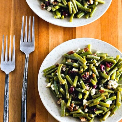 Green Bean Salad with Blue Cheese, Cranberries, and Pecans finished salad on serving plates