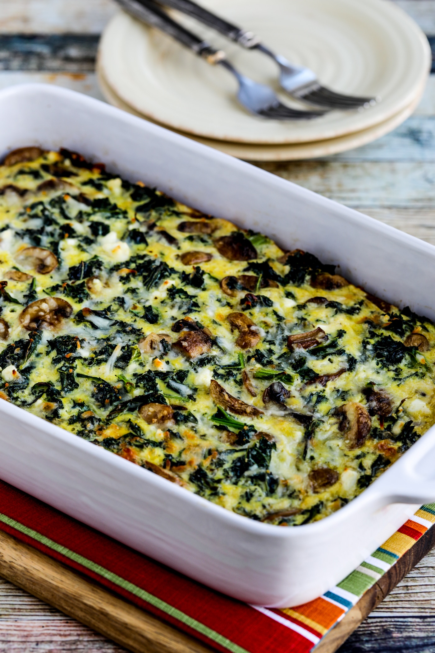 Kale, Mushroom, and Cheese Breakfast Casserole finished casserole in baking dish