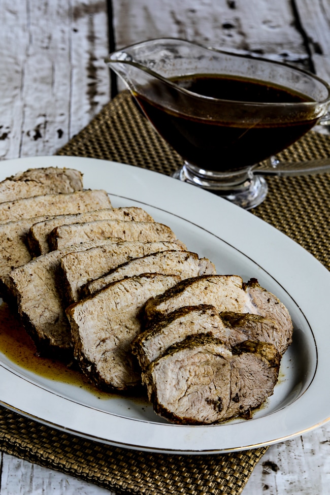 The slow cooker finished off with grilled pork loin on a serving platter