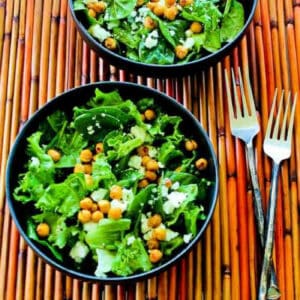Green Salad with Chickpeas and Feta shown in two bowls with forks.