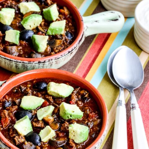 Beef Chili with Sausage, Mushrooms, and Olives close-up photo