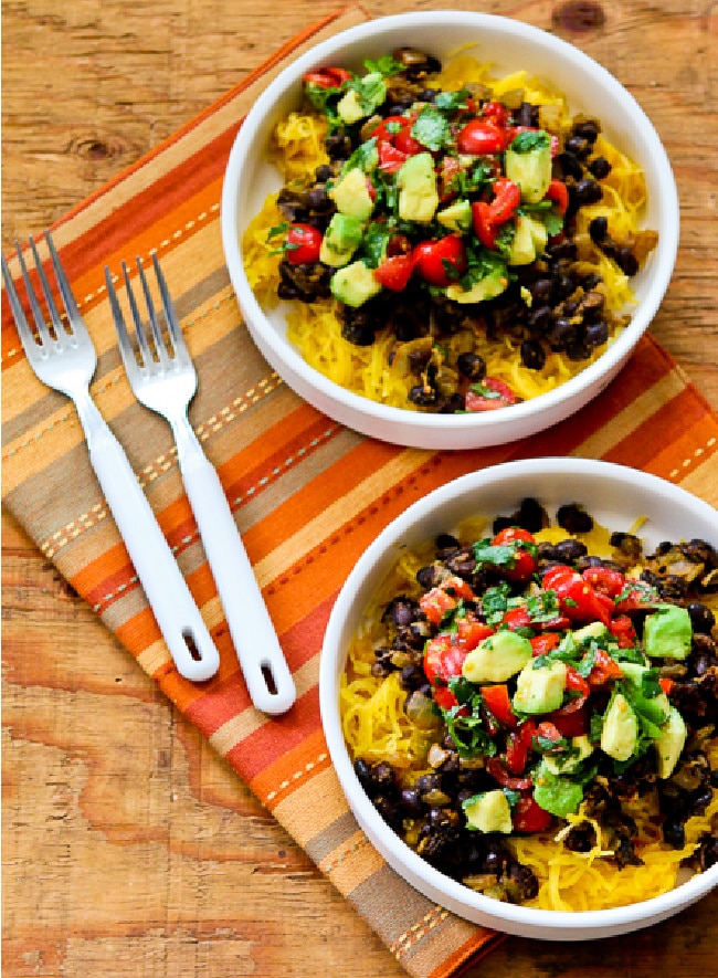 Spaghetti Squash Burrito Bowl in two bowls with forks
