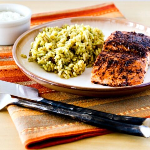 Salmon Roasted in Olive Oil finished salmon on serving plate with rice