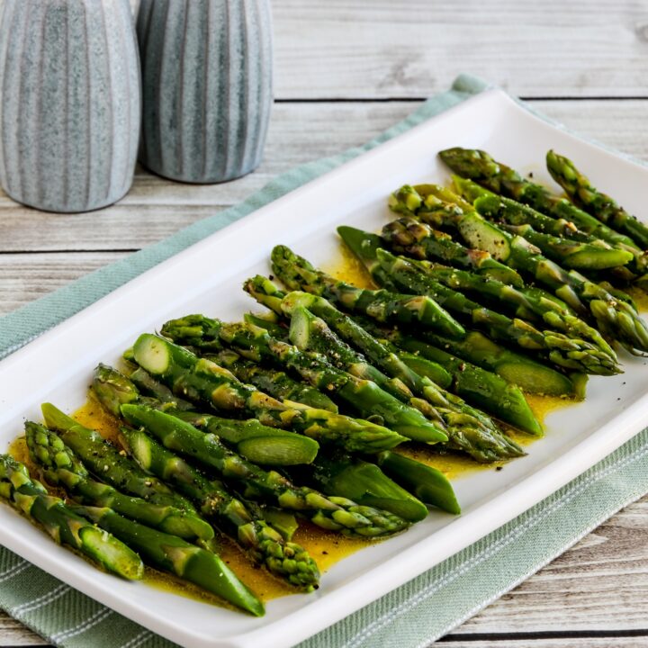 Barely-Cooked Asparagus with Lemon-Mustard Vinaigrette finished asparagus with vinaigrette on serving dish