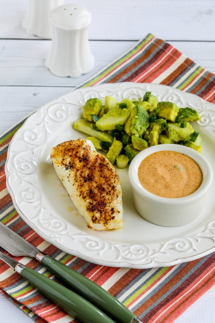 Spicy Air Fryer Fish on plate with salad and remoulade sauce