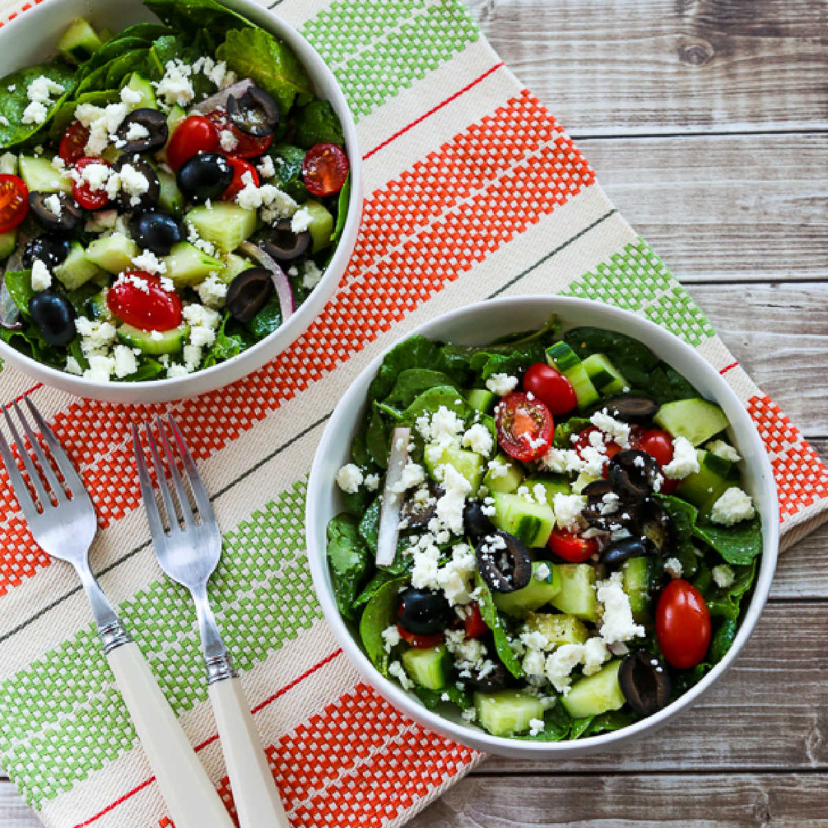 Kale Greek Salad square image in two serving bowls