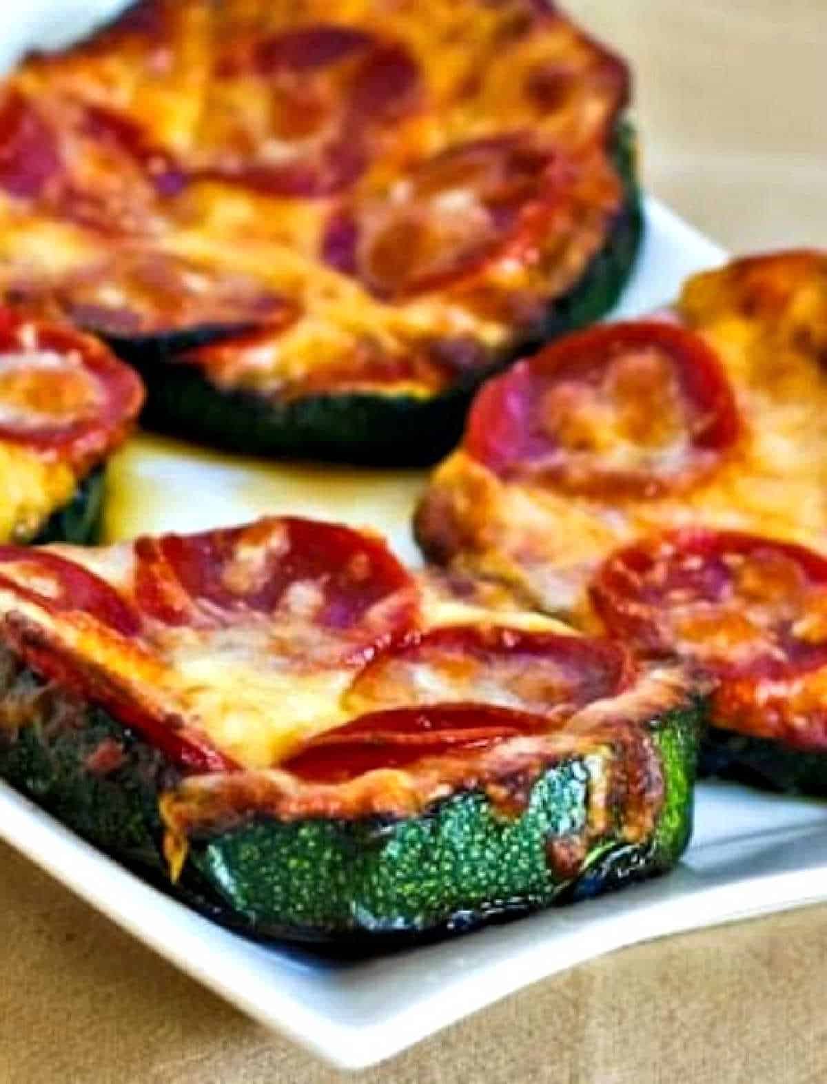 cropped photo of Grilled Zucchini Pizza Slices on serving plate