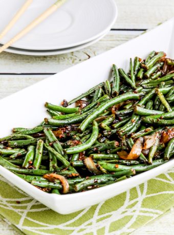 Garlicky Green Beans Stir Fry farther away shot of green beans on serving dish