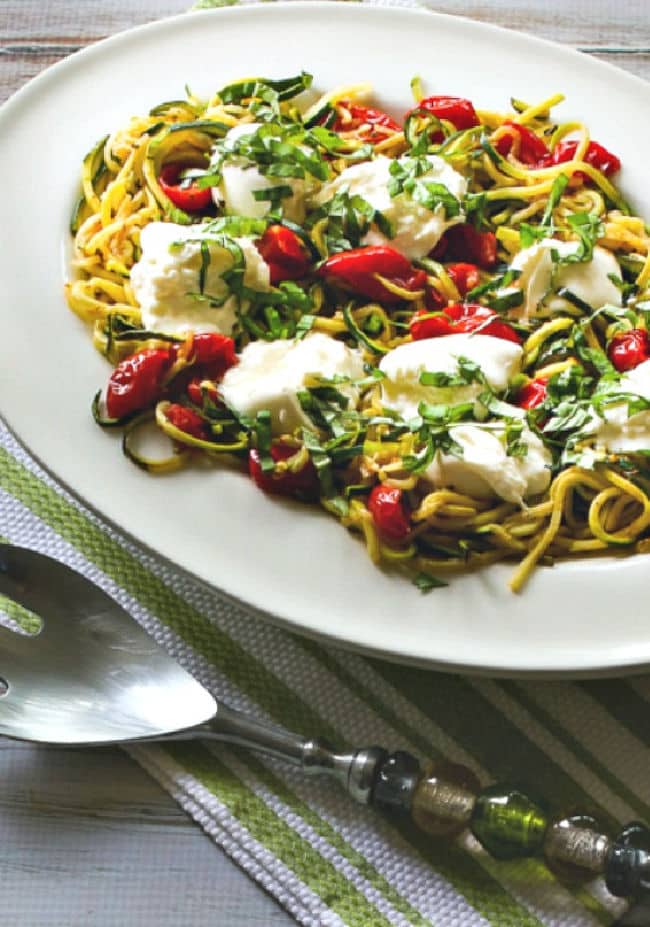 Zucchini Noodles with Tomatoes and Burrata in serving bowl
