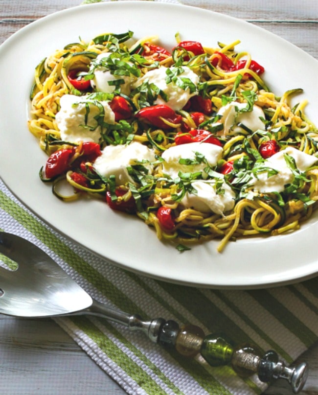 Garlicky Zucchini Noodles with Tomatoes and Burrata close-up photo