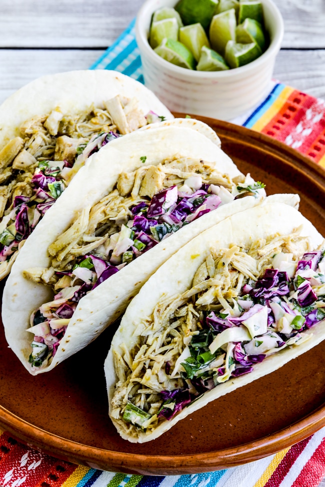 Green Chile Chicken Tacos close-up photo of finished tacos on plate