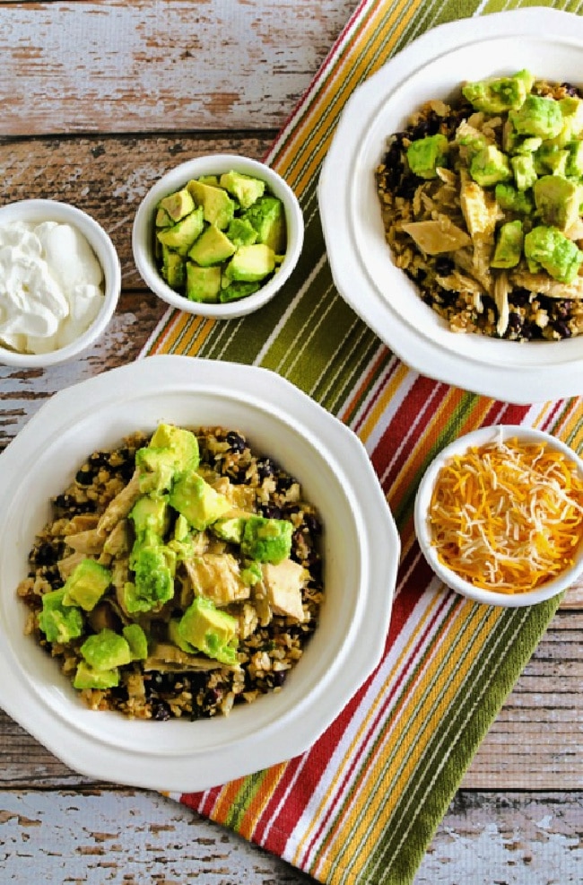 Slow Cooker Green Chile Chicken Burrito Bowl finished bowls with toppings