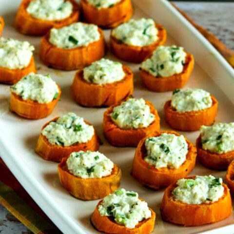 Sweet Potato Appetizer Bites with Feta and Green Onion close-up photo
