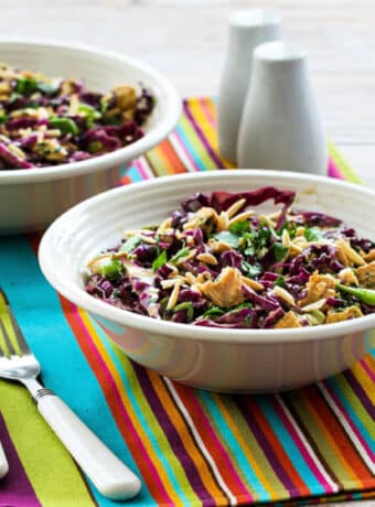 Square image for Asian Red Cabbage Salad shown in two bowls.