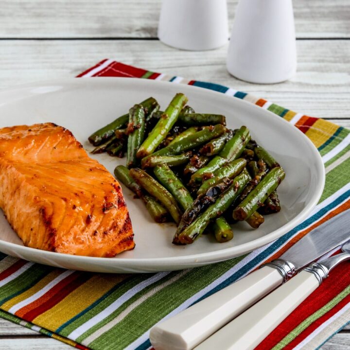Maple Glazed Salmon shown on serving plate with green beans