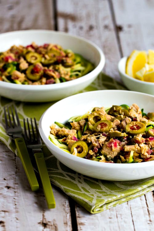 Low-Carb Zucchini Noodles with Tuna and Green Olives close-up photo