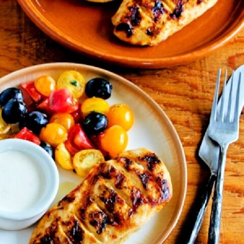 Grilled Chicken with White Barbecue Sauce finished chicken on plate with sauce