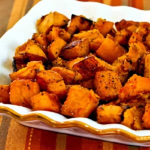 Butternut Squash with Rosemary and Balsamic Vinegar shown in serving bowl on napkin