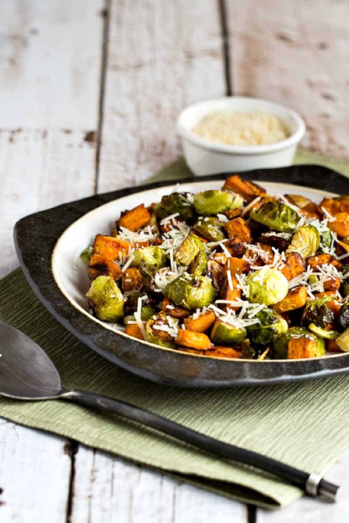 Sweet potatoes and brussels sprouts on a serving plate