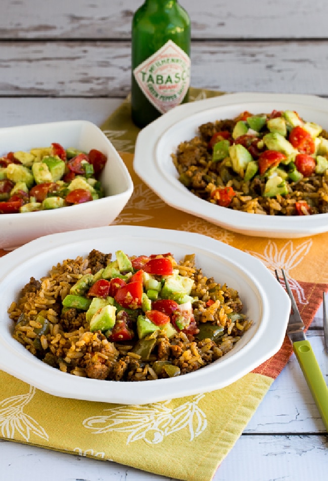 Slow Cooker Turkey Taco Bowls shown in serving bowl with salsa