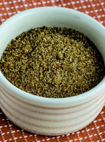 Square image of Sweet Potato Fries Seasoning in small bowl on napkin.