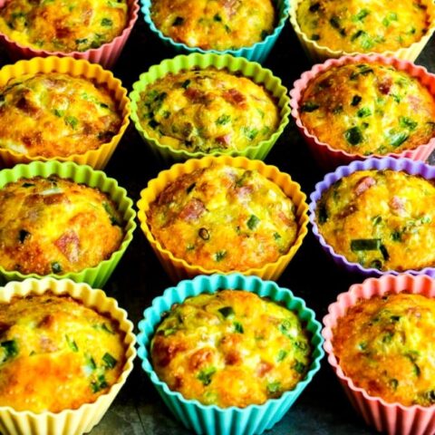 Egg Muffins with Ham, Cheese, and Bell Pepper finished muffins on baking sheet