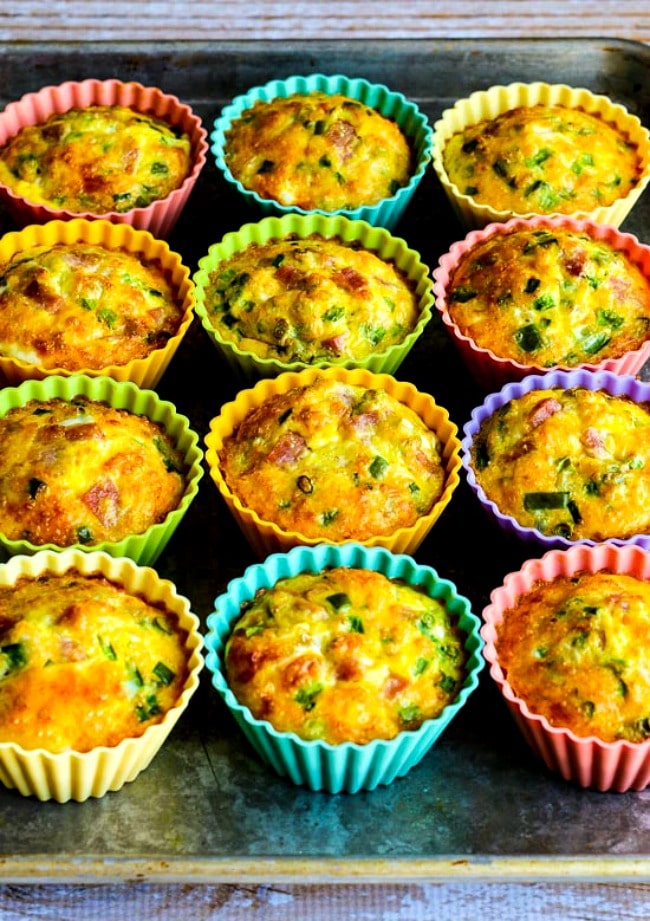 Egg Muffins with Ham, Cheese, and Bell Pepper finished muffins on baking sheet