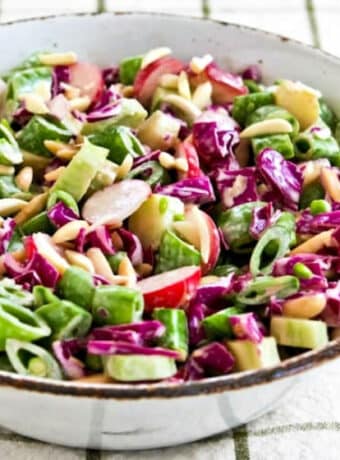 Square image for Asian Chopped Salad shown in serving bowl on napkin.