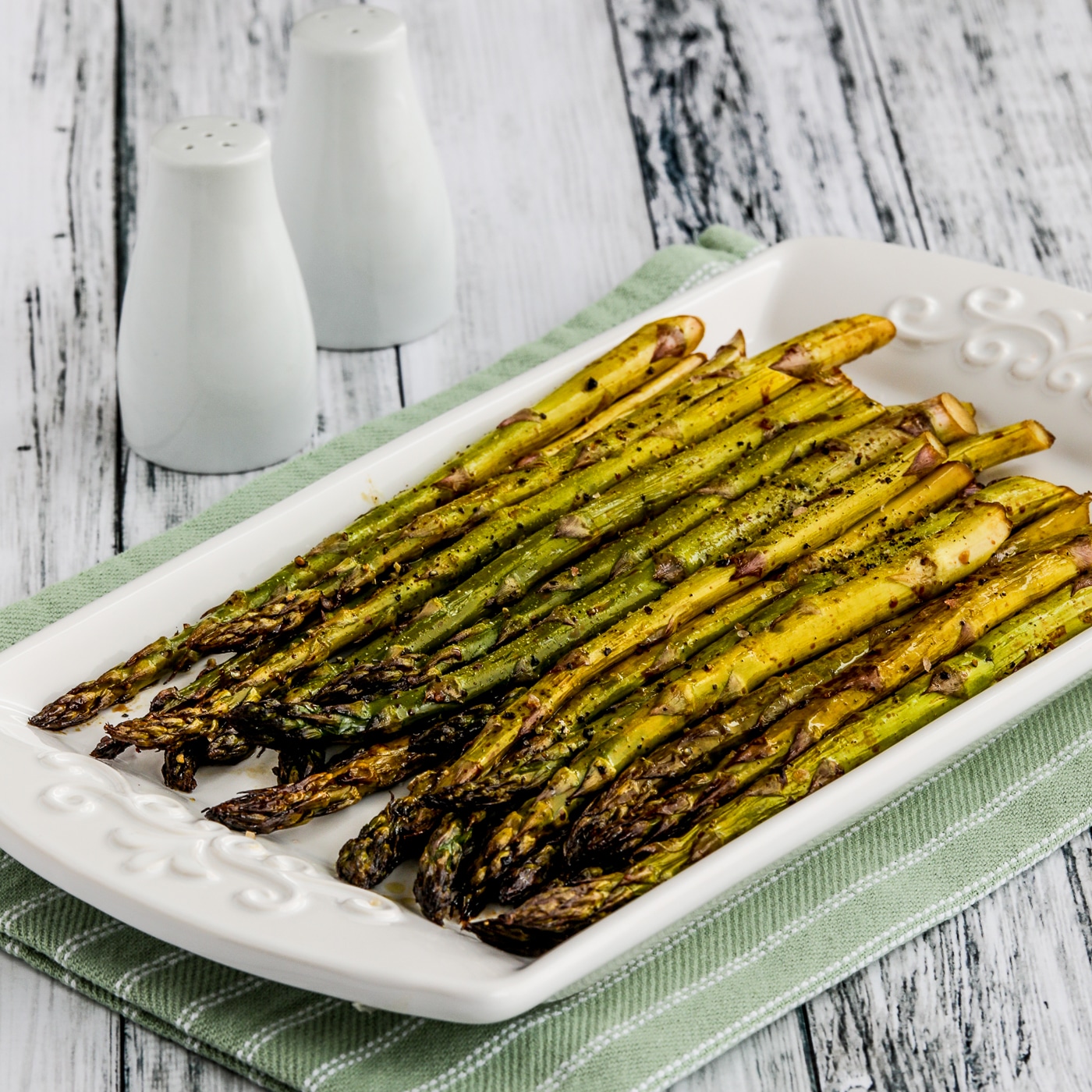 Easy Roasted Asparagus square thumbnail image of finished asparagus on serving platter
