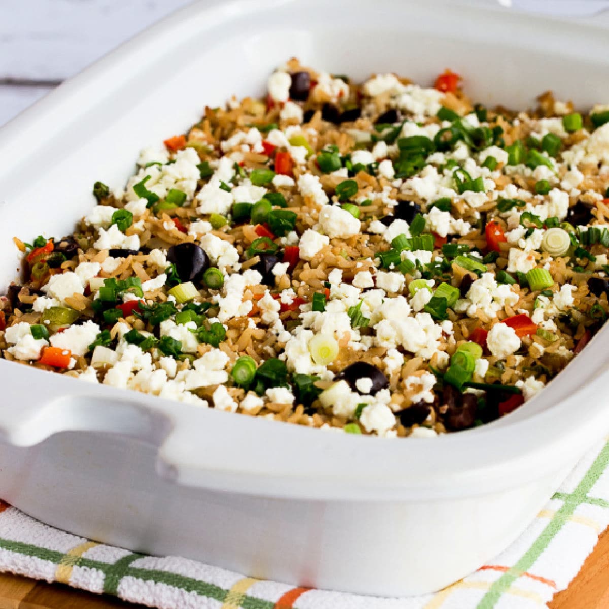 Square image of Greek Slow Cooker Rice in Casserole Crock Pot.