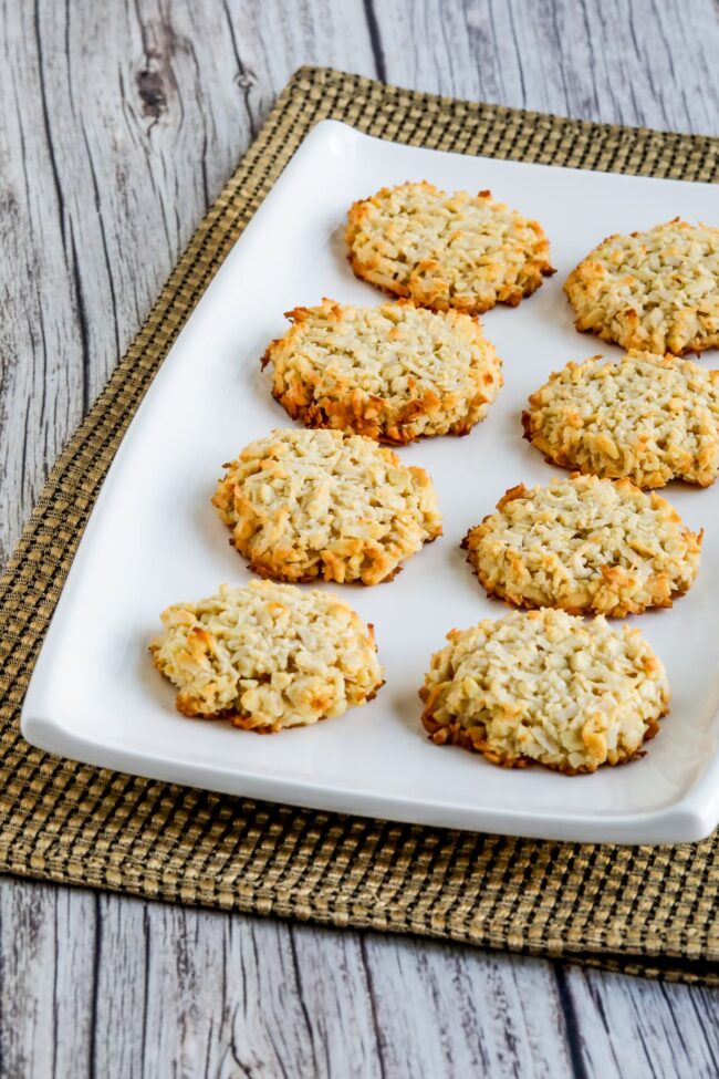 Less close-up view of Sugar-Free Coconut Macaroon Cookies on serving plate.