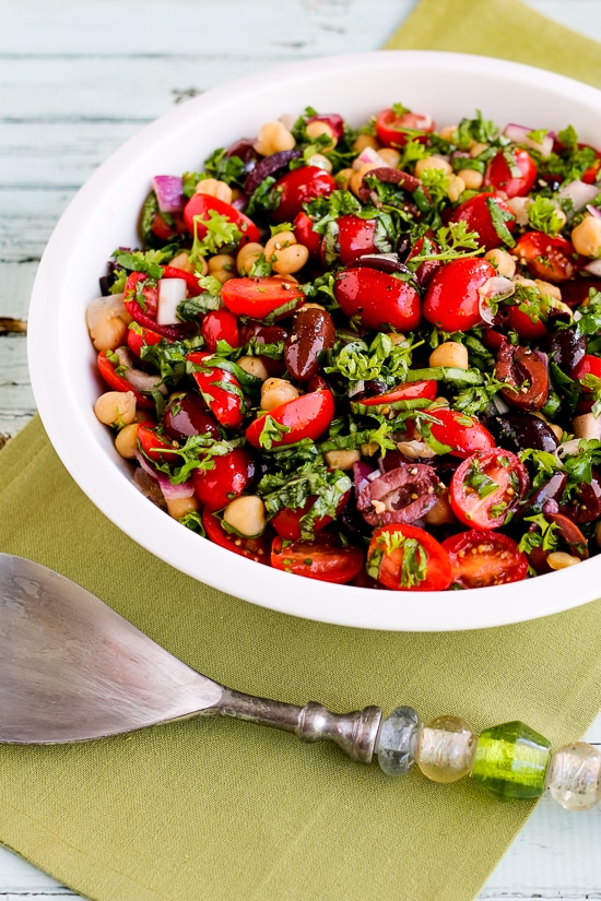 Chickpea Salad with Tomatoes, Olives, and Herbs finished salad in serving bowl