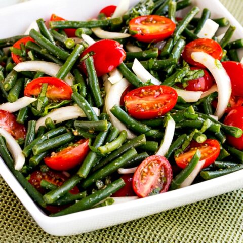 close-up photo of Green Bean and Tomato Salad in serving bowl