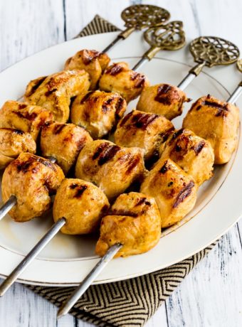 Grilled Chicken Kabobs with Asian Marinade finished kabobs on serving plate