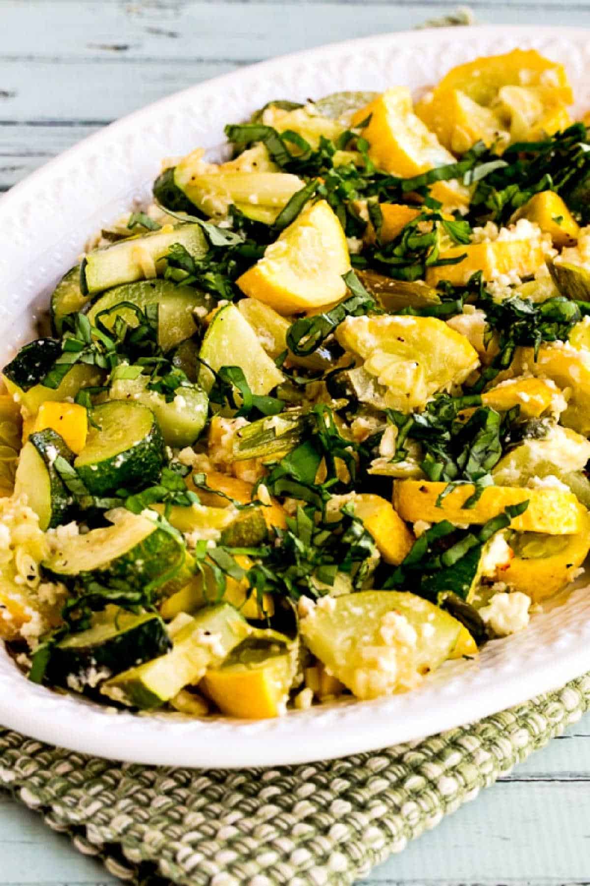Roasted Summer Squash with Feta and Basil shown on serving platter