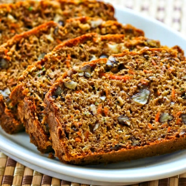 Garden Harvest Cake with Zucchini, Apple, and Carrot cake served on plate top photo