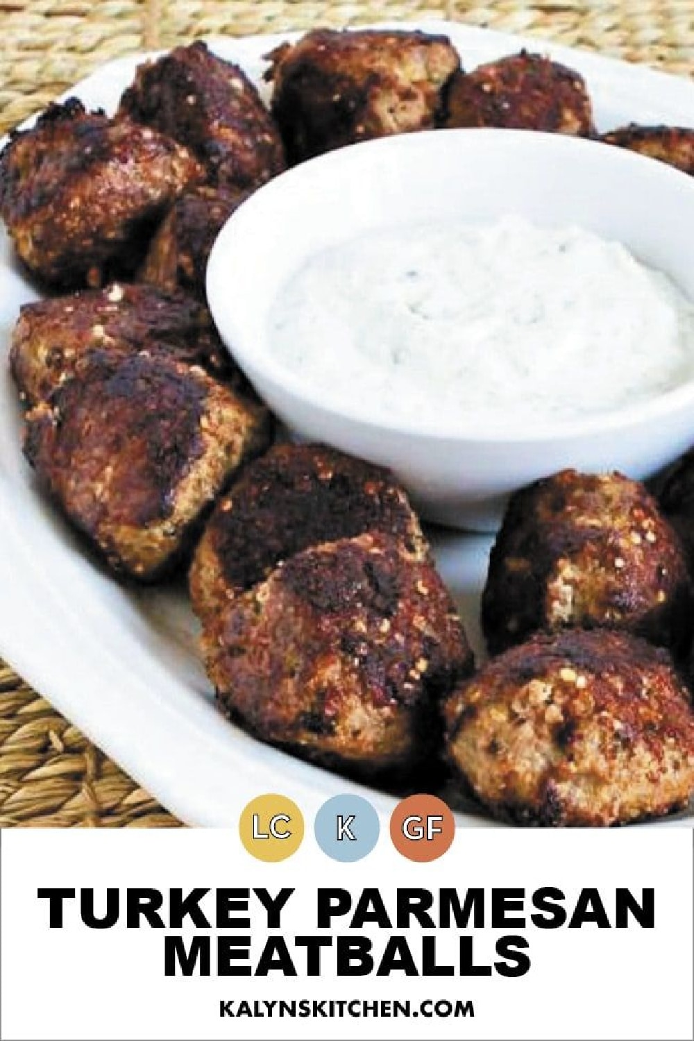 Pinterest image for Turkey Parmesan Meatballs shown on serving platter with Tzatziki Sauce.