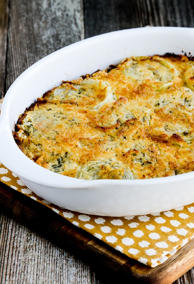 cropped image of onion gratin in baking dish